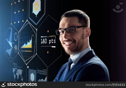business, people and technology concept - smiling businessman in glasses over black background with virtual screens. smiling businessman in glasses over black