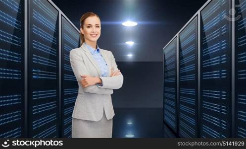 business, people and technology concept - smiling businesswoman over server room background. businessman over server room background