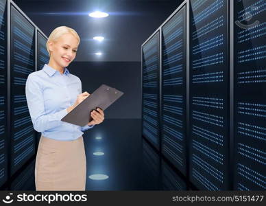 business, people and technology concept - smiling businesswoman with clipboard over server room background. businessman with clipboard over server room