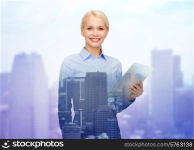 business, people and technology concept - smiling businesswoman with tablet pc computer over city background