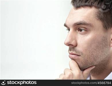 business, people and work concept - close up of businessman male face