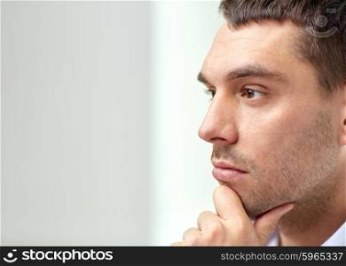 business, people and work concept - close up of businessman male face