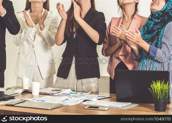 Business people applauding in a business meeting. Conference and presentation award concept.