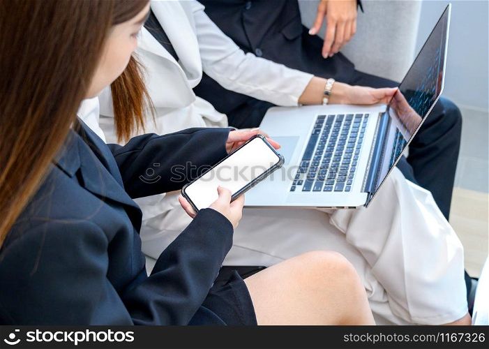Business people are playing mobile phones and using computers