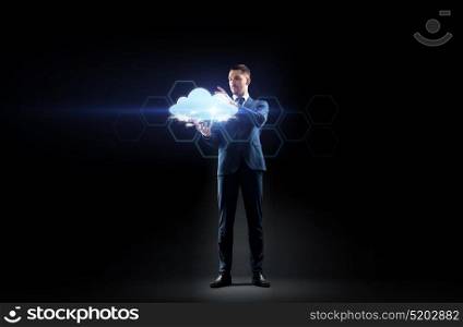 business, people, augmented reality and future technology concept - businessman working with virtual cloud hologram over black background. businessman working with virtual cloud hologram