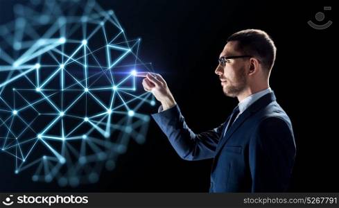 business, people, augmented reality and network concept - businessman working with virtual low poly projection over black background. businessman with virtual low poly projection