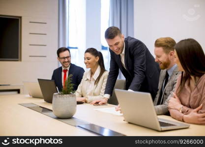 Business people brainstorming in modern office during conference