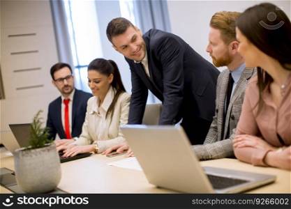 Business people brainstorming in modern office during conference