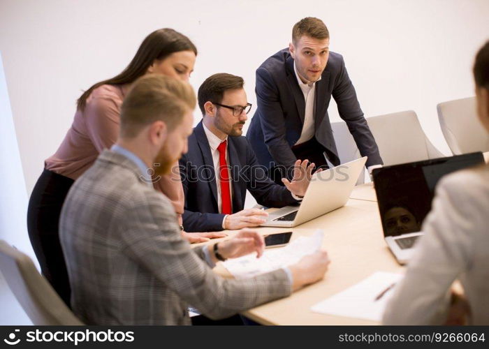 Business people brainstorming in modern office during conference