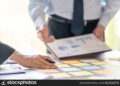 Business People brainstorming Meeting Design Ideas use post it notes to share idea professional investor start up project business brainstorming planning in office.