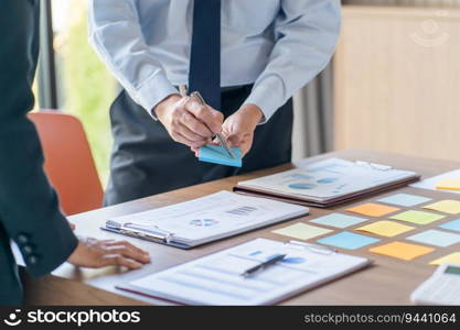 Business People brainstorming Meeting Design Ideas use post it notes to share idea professional investor start up project business brainstorming planning in office.