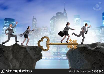 Business people chasing each other towards key to success