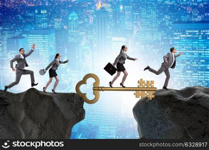 Business people chasing each other towards key to success