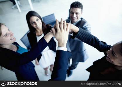 Business people cheering with hands together