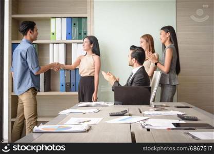 business people clapping in office after signing agreement, Achievement, congratulation and appreciation concept, selective focus