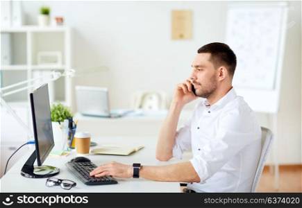 business, people, communication and technology concept - businessman with computer calling on smartphone at office. businessman calling on smartphone at office