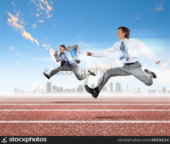 Business people competing. Image of business people running on tracks. Competition concept