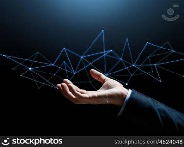 business, people, cyberspace, network and future technology concept - close up of businessman hand with hologram over black background