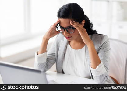 business, people, deadline and technology concept - stressed businesswoman with laptop computer at office. stressed businesswoman with laptop at office