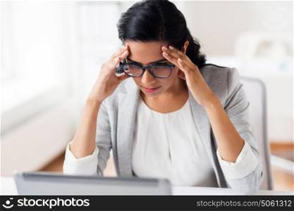 business, people, deadline and technology concept - stressed businesswoman with laptop computer at office. stressed businesswoman with laptop at office
