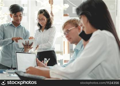 business people discussing on performance revenue in meeting. businessman working with co-worker team. financial adviser analyzing data with investor.