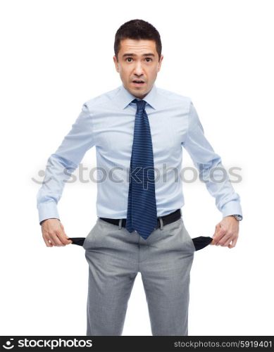 business, people, emotions, bankruptcy and failure concept - surprised businessman showing empty pockets