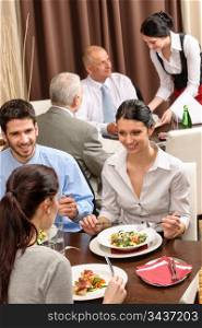 Business people enjoy lunch at the restaurant management discussion