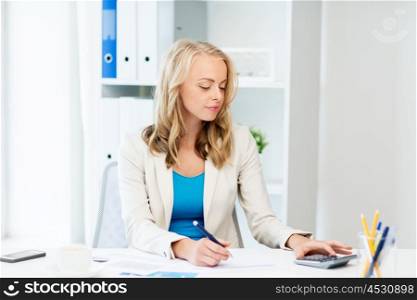 business, people, finance and accounting concept - smiling businesswoman with calculator counting and filling tax form at office