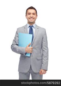 business, people, finances and paper work concept - happy smiling businessman in suit holding folder