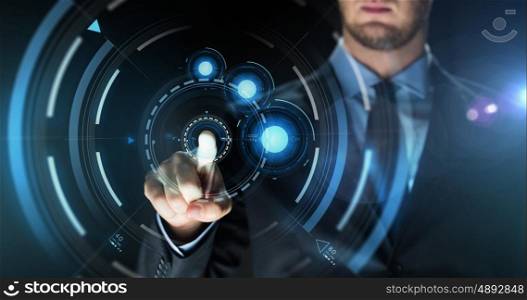 business, people, future technology and cyberspace concept - close up of businessman touching projection on virtual screen over dark background