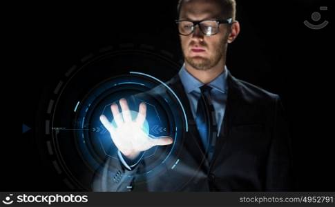 business, people, future technology and cyberspace concept - close up of businessman touching projection on virtual screen over dark background. businessman touching virtual screen projection
