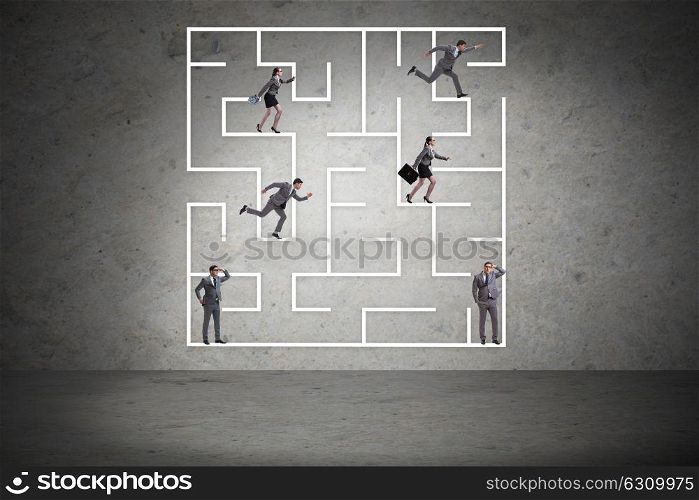 Business people getting lost in maze uncertainty concept