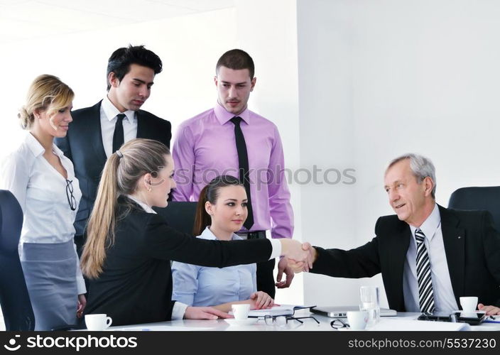 business people group at a meeting in a light and modern office environment.