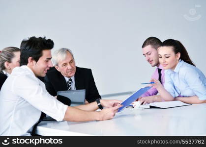 business people group at a meeting in a light and modern office environment.