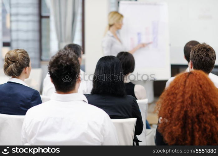 business people group at meeting seminar presentation in brigt conference room