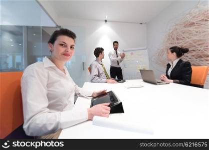 business people group brainstorming on meeting at office, businessman presenting plans, tasks, ideas and projects on white flip board