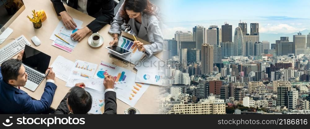 Business people group meeting shot from top widen view in office . Profession businesswomen, businessmen and office workers working in team conference with project planning document on meeting table .. Business people group meeting shot from top widen view