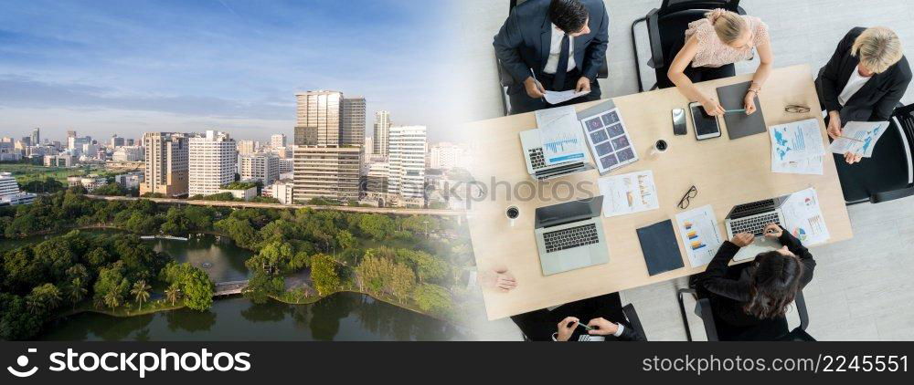 Business people group meeting shot from top widen view in office . Profession businesswomen, businessmen and office workers working in team conference with project planning document on meeting table .. Business people group meeting shot from top widen view