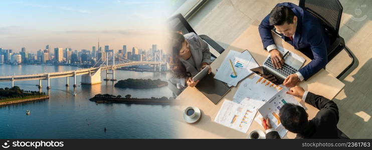 Business people group meeting shot from top widen view in office . Profession businesswomen, businessmen and office workers working in team conference with project planning document on meeting table .. Business people group meeting shot from top widen view