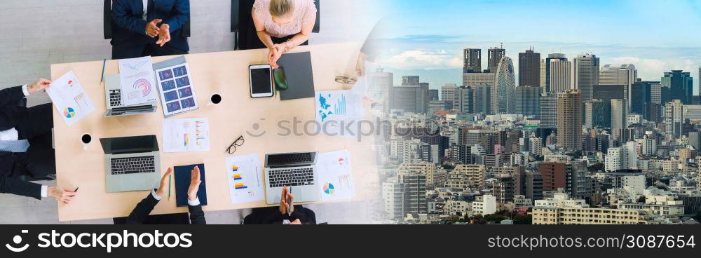 Business people group meeting shot from top widen view in office . Profession businesswomen, businessmen and office workers working in team conference with project planning document on meeting table .. Business people group meeting shot from top widen view