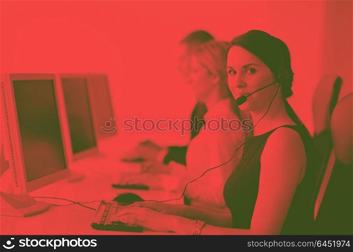 business people group with headphones giving support in help desk office to customers, manager giving training and education instructions