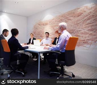 business people group with young adults and senior on meeting at modern bright office interior.