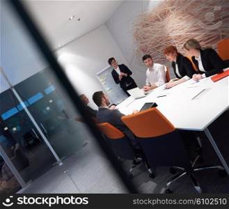 business people group with young adults and senior on meeting at modern bright office interior.