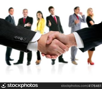 business people handshake with company team in background