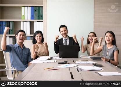 Business people happy after signing agreement in office, successful teamwork concept. Business people happy after signing agreement, successful teamwo