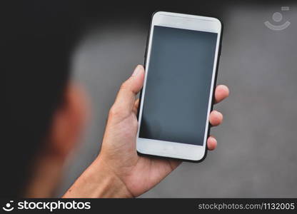 Business people holding cell phone or mobile smart phone technology communication