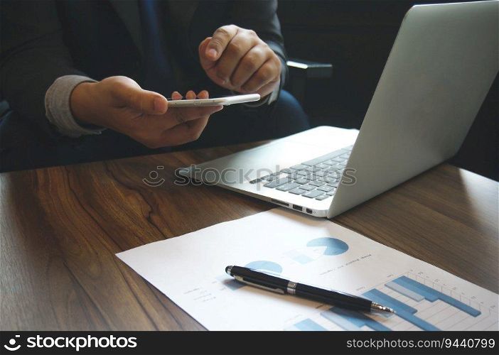 Business people holding Smartphone working mobile devices. cell telephone technology e-commerce 