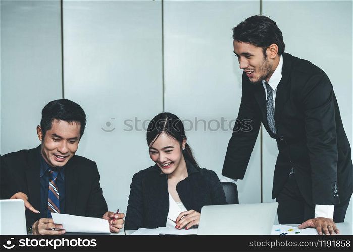 Business people in group meeting working in office room with colleagues. Corporate workplace concept.