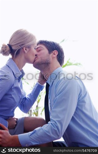 business people in love have romantic time at workplace