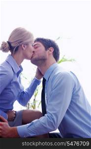 business people in love have romantic time at workplace